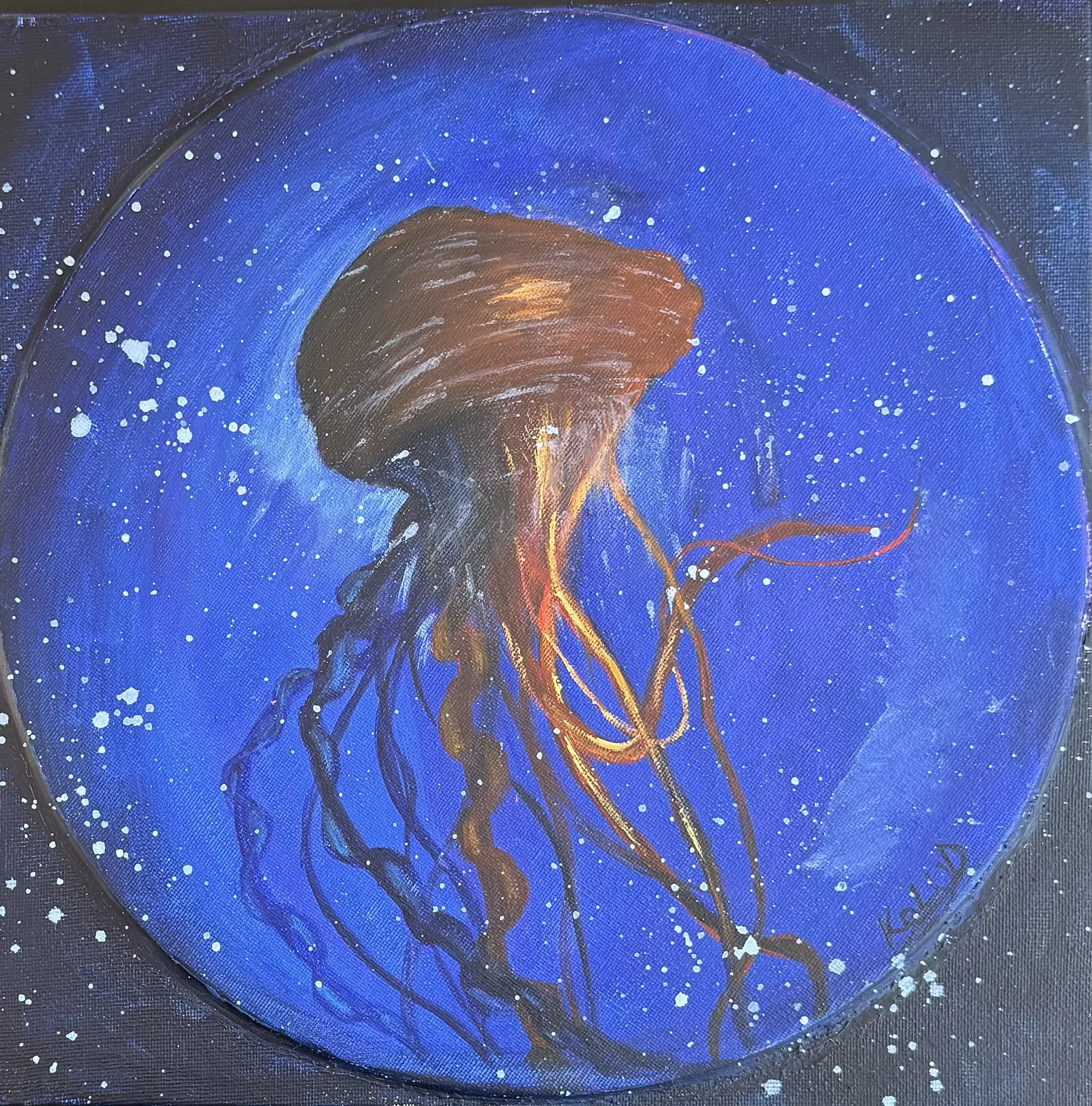 Blue and gold jellyfish painting on a round canvas.